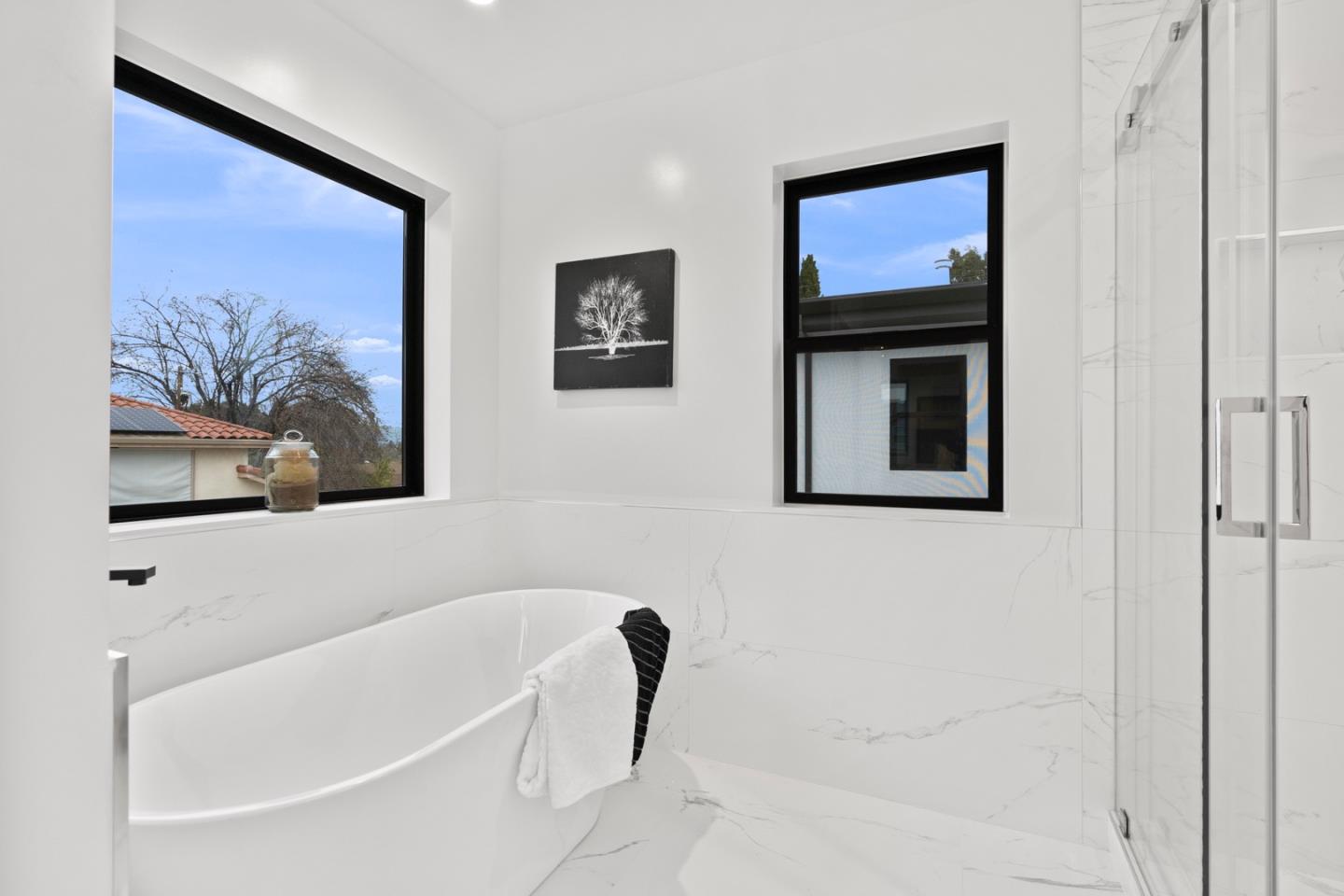 719 East Homestead Road Sunnyvale, CA 94087 - Photo 24 of 47 a bathroom with a bathtub and a shower