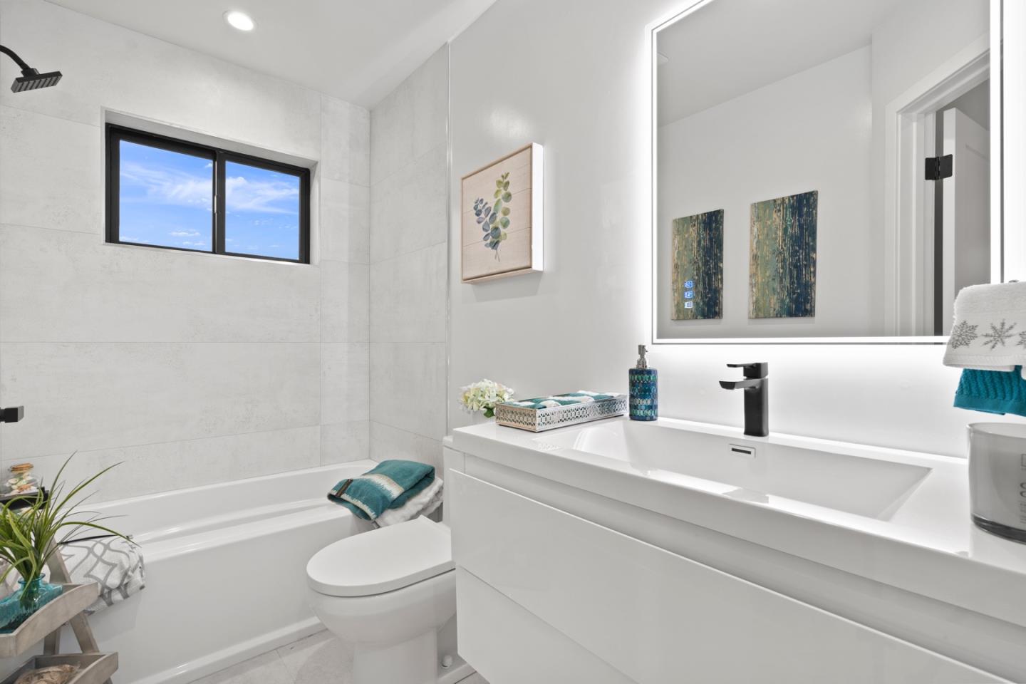 719 East Homestead Road Sunnyvale, CA 94087 - Photo 30 of 47 a bathroom with a sink a toilet and shower