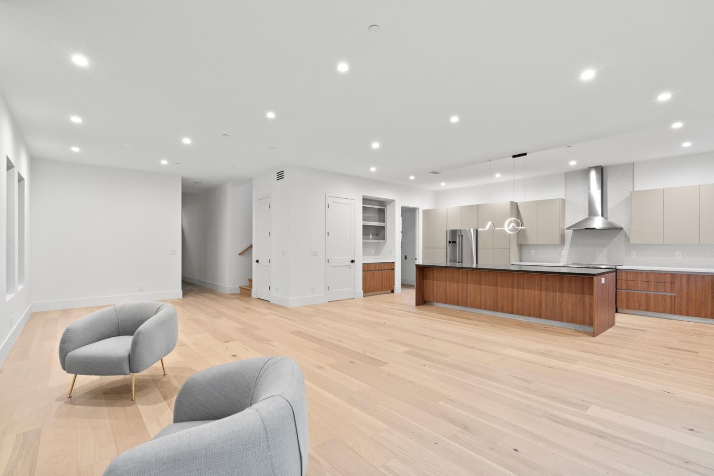 719 East Homestead Road Sunnyvale, CA 94087 - Photo 38 of 47 a large room with a couch and chandelier