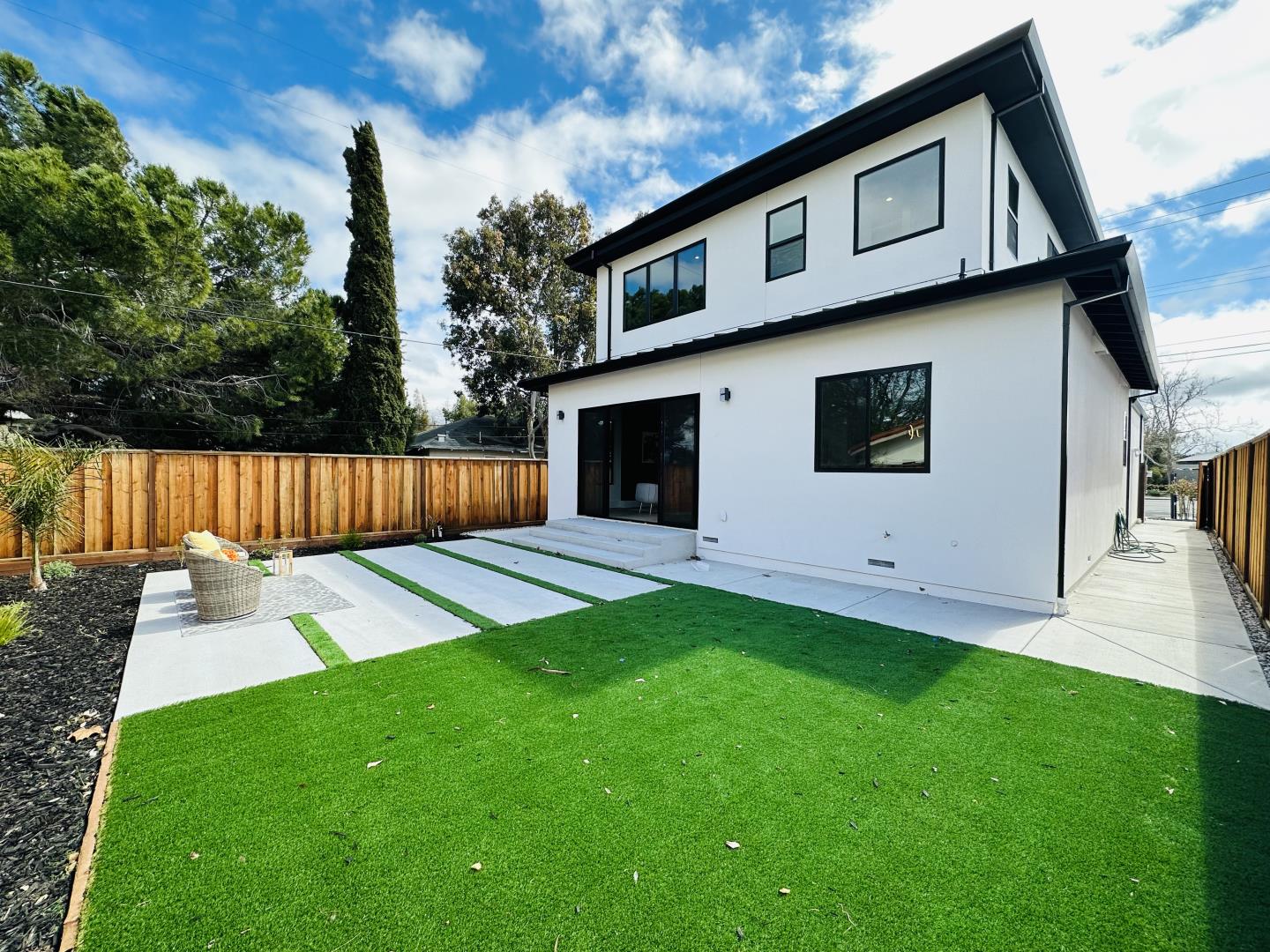 719 East Homestead Road Sunnyvale, CA 94087 - Photo 45 of 47 a front view of a house with yard and a garden