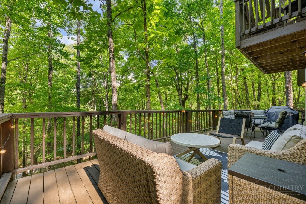 216 Saddle Lane Deep Gap, NC 28618 - Photo 25 of 44 a view of a patio in a balcony