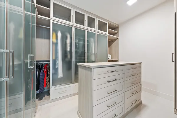 a view of a hallway with closet