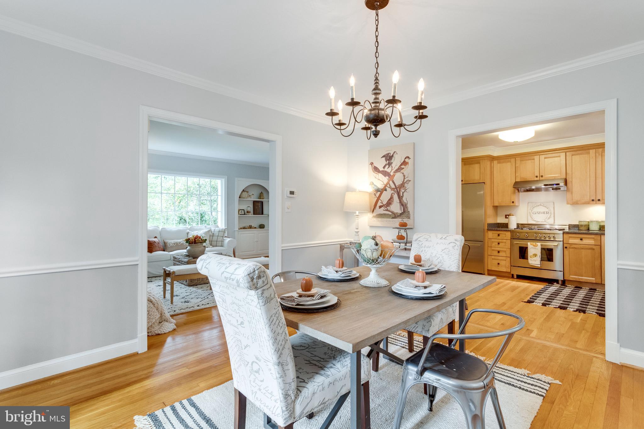 7107 Fort Hunt Road Alexandria, VA 22307 - Photo 17 of 62 Dining room with openings to living room & kitchen