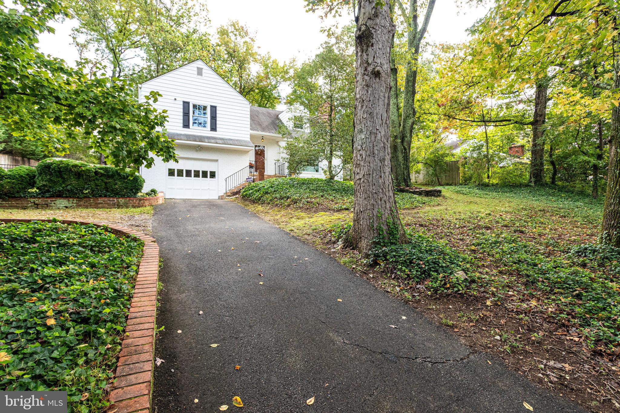 7107 Fort Hunt Road Alexandria, VA 22307 - Photo 3 of 62 Long driveway with 2 car parking to the side