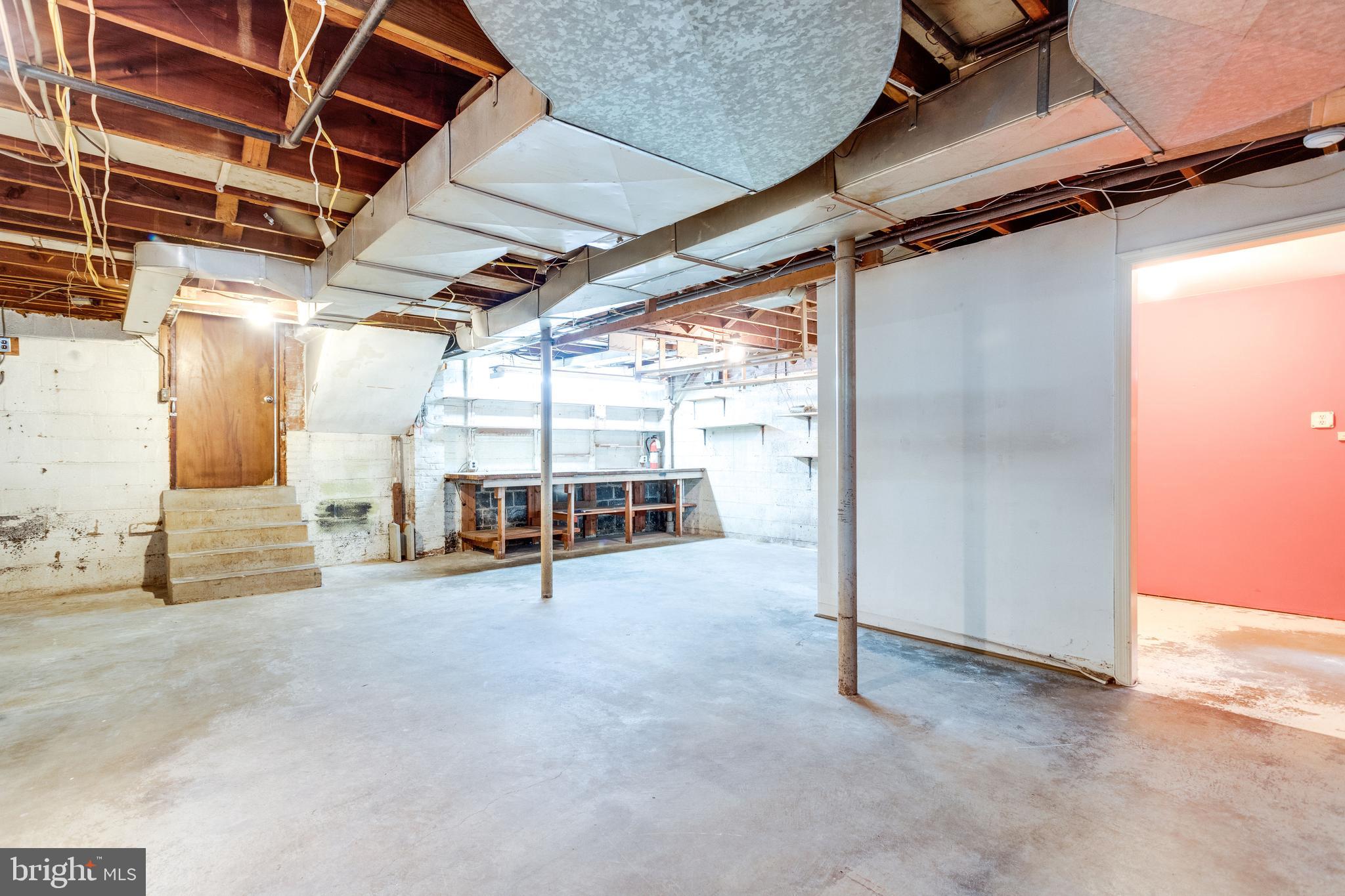 7107 Fort Hunt Road Alexandria, VA 22307 - Photo 53 of 62 Basement w/ work bench & extra storage room