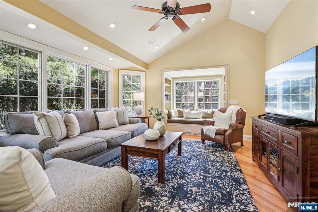 132 Dimmig Road Upper Saddle River, NJ 07458 - Photo 12 of 33 a living room with furniture and a large window