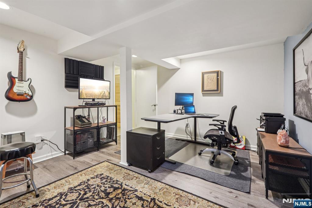132 Dimmig Road Upper Saddle River, NJ 07458 - Photo 25 of 33 a view of a workspace with furniture and a window