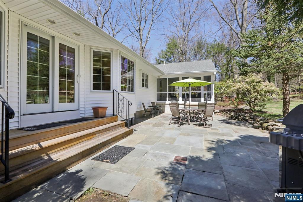 132 Dimmig Road Upper Saddle River, NJ 07458 - Photo 30 of 33 a view of house with outdoor seating space