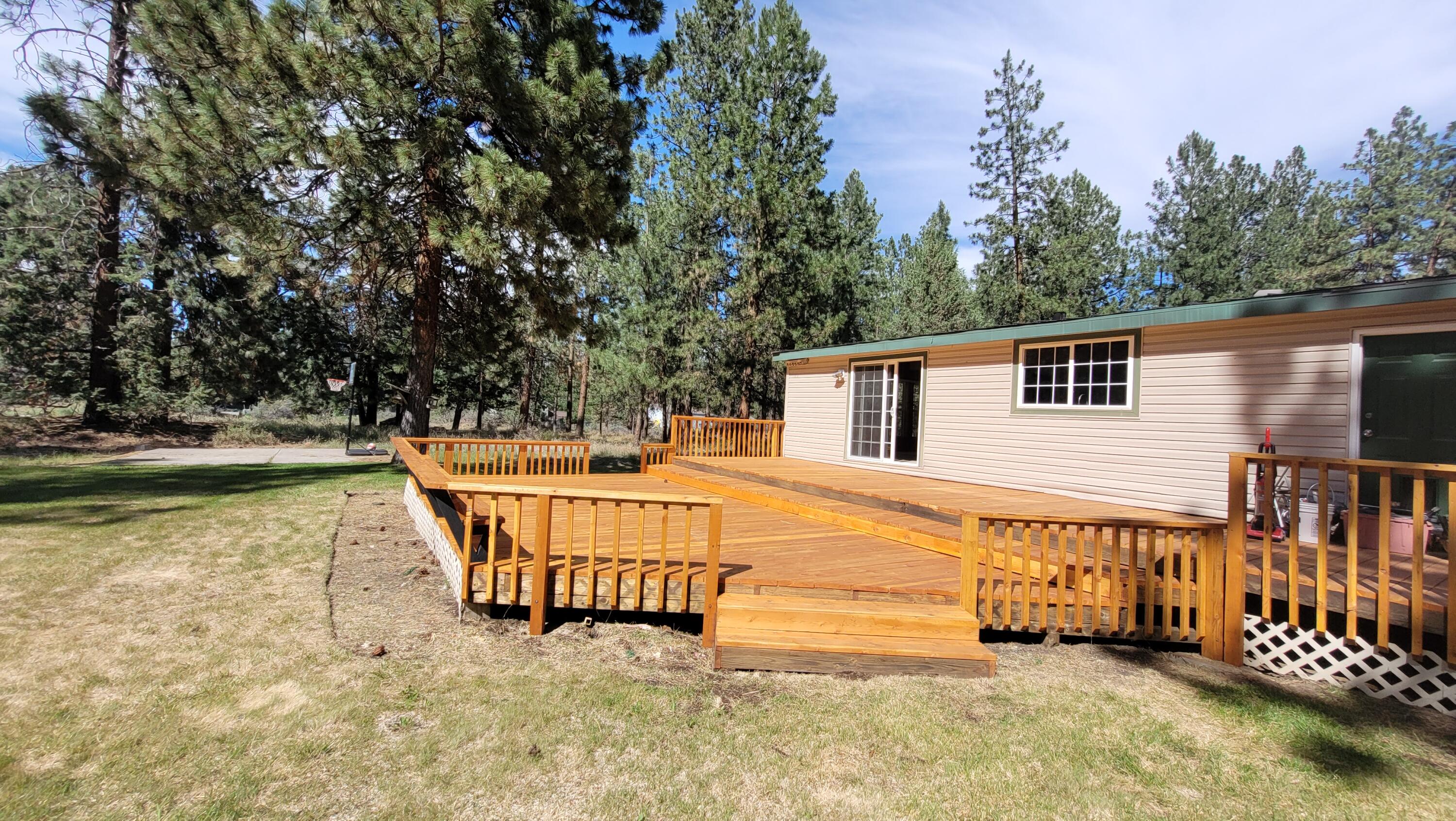 19724 Buck Canyon Road Bend, OR 97702 - Photo 19 of 38 This new deck will accommodate many at a B.B.Q.