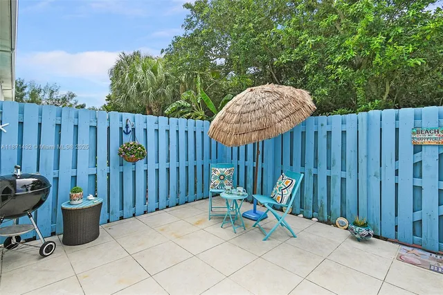 a view of outdoor space with seating area