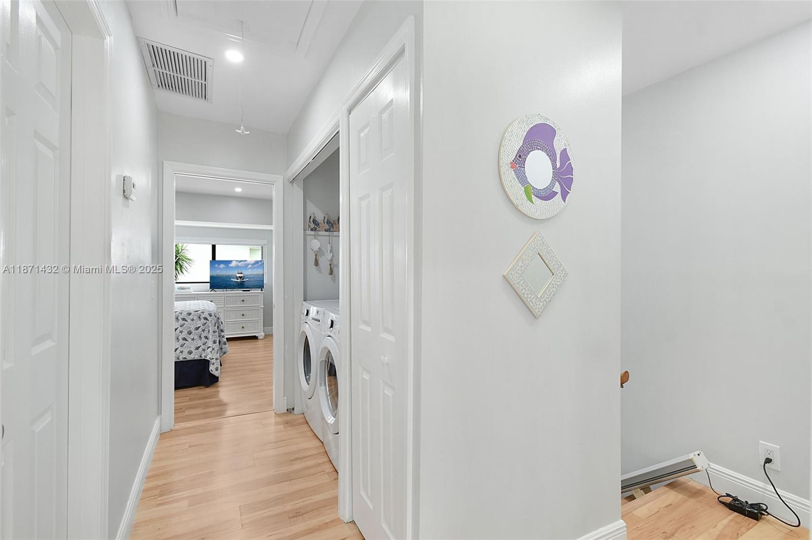 9421 South Ocean Drive, Unit 90 Jensen Beach, FL 34957 - Photo 27 of 49 a view of a hallway with elevator