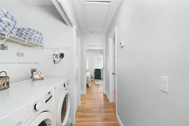 a bedroom with a large bed and a dresser