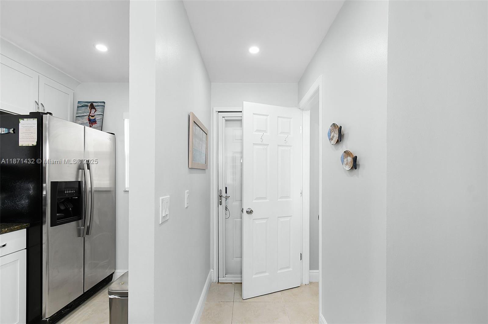 9421 South Ocean Drive, Unit 90 Jensen Beach, FL 34957 - Photo 5 of 49 a bathroom with a shower and a glass door