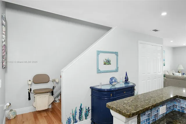 a room with a table and chairs