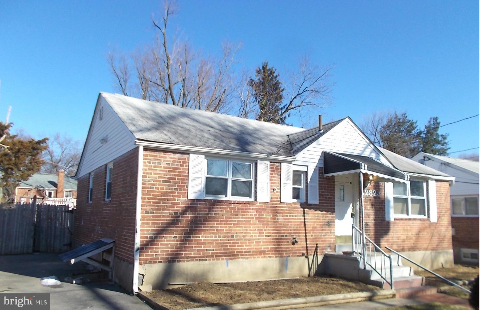 12823 Matey Road Silver Spring, MD 20906 - Photo 2 of 14 a view of a house with a patio