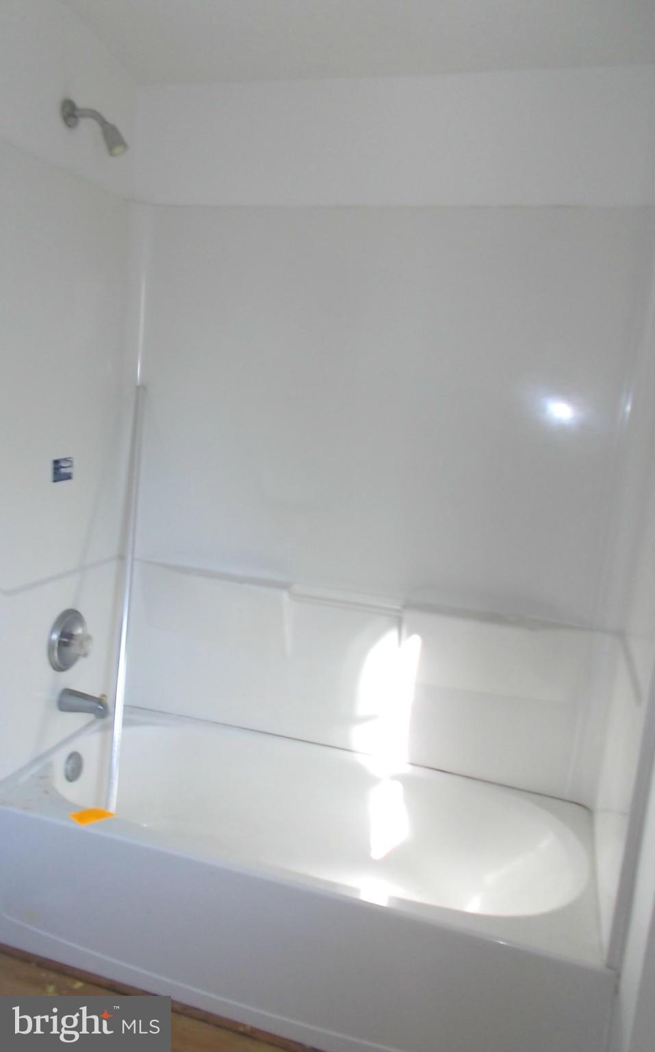 12823 Matey Road Silver Spring, MD 20906 - Photo 14 of 14 a bathroom with a bathtub