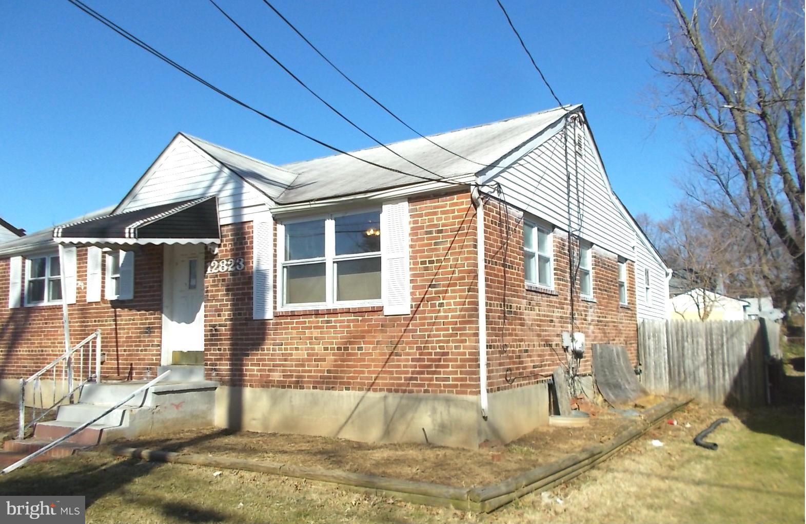 12823 Matey Road Silver Spring, MD 20906 - Photo 3 of 14 a view of house with a yard