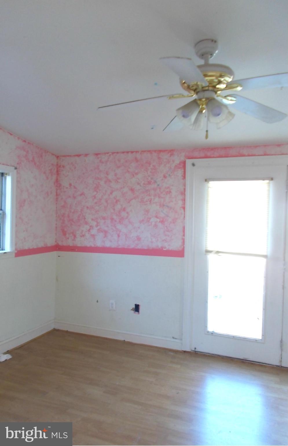 12823 Matey Road Silver Spring, MD 20906 - Photo 8 of 14 an empty room with a window