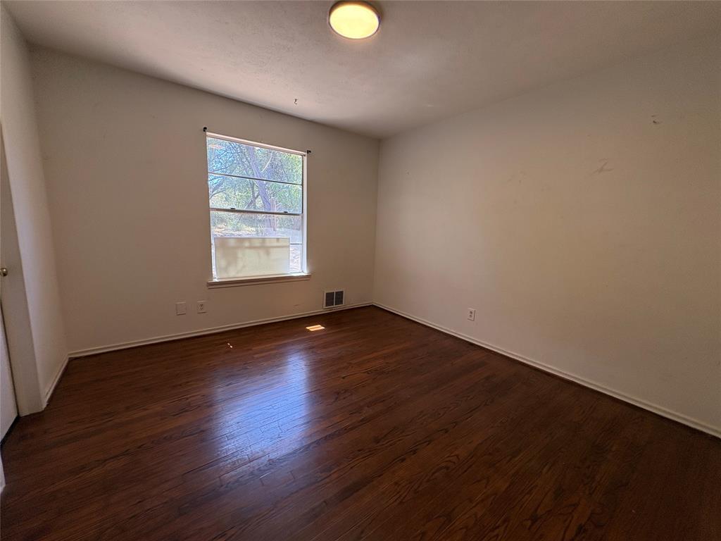 5454 Ranchero Lane Dallas, TX 75236 - Photo 13 of 24 Hardwood flooring, recessed window, and flush mount lighting