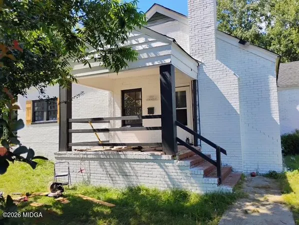 a view of a house with a patio