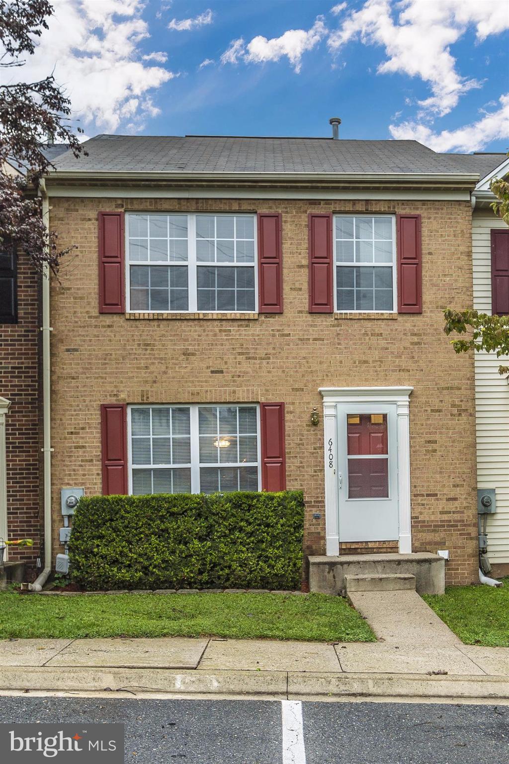 6408 View Point Court Frederick, MD 21703 - Photo 1 of 30 a front view of a house with a garden