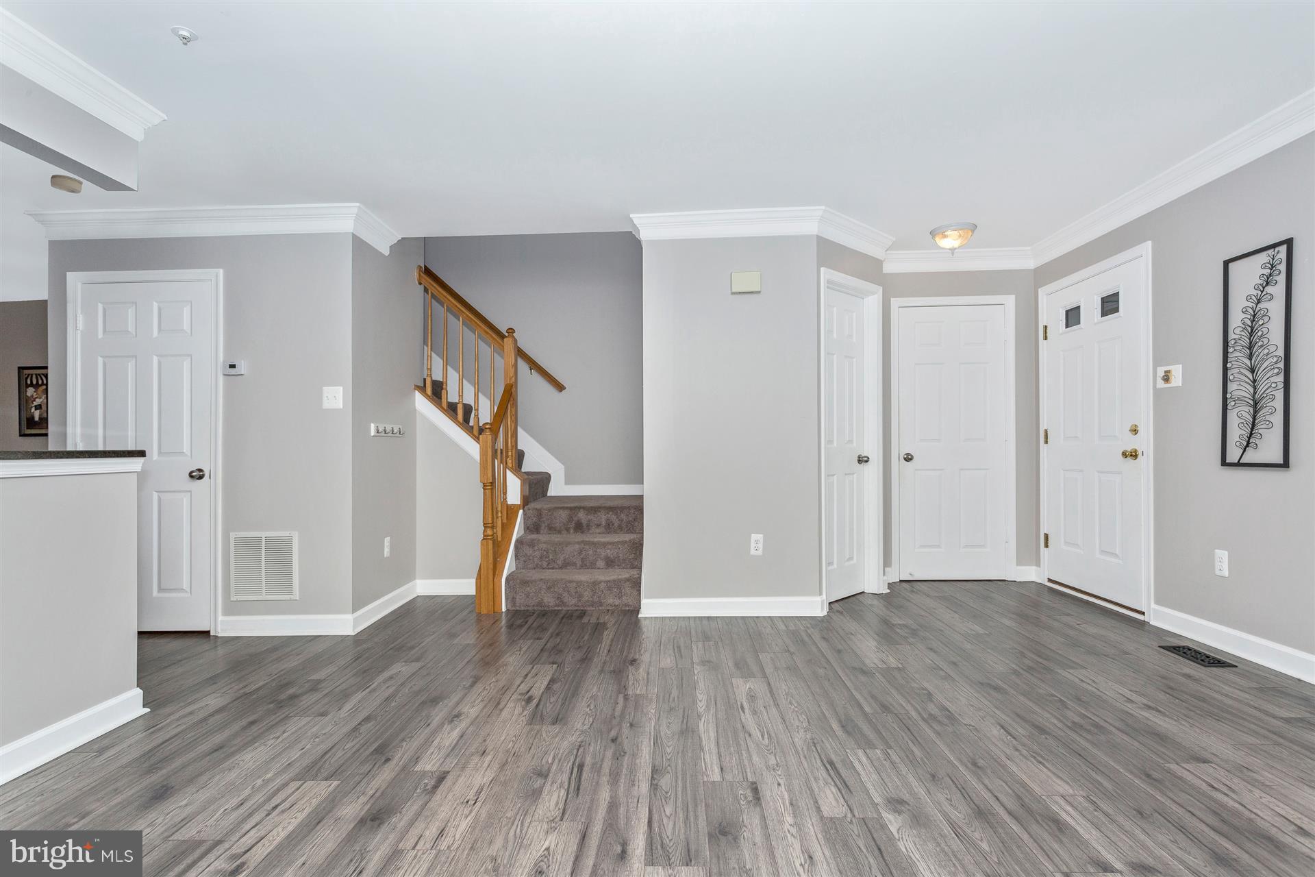 6408 View Point Court Frederick, MD 21703 - Photo 2 of 30 a view of entryway with wooden floor