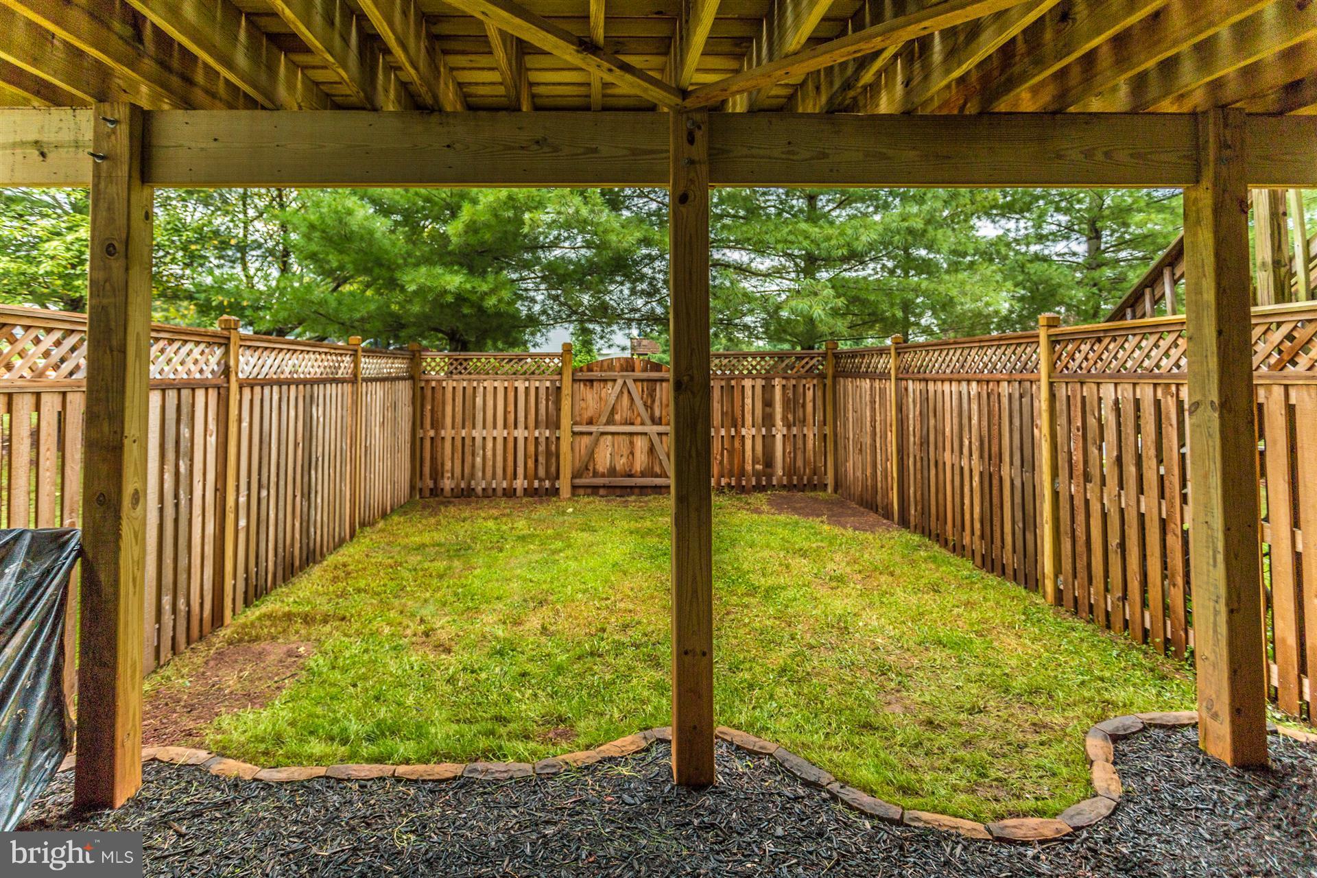 6408 View Point Court Frederick, MD 21703 - Photo 26 of 30 a view of a backyard with garden