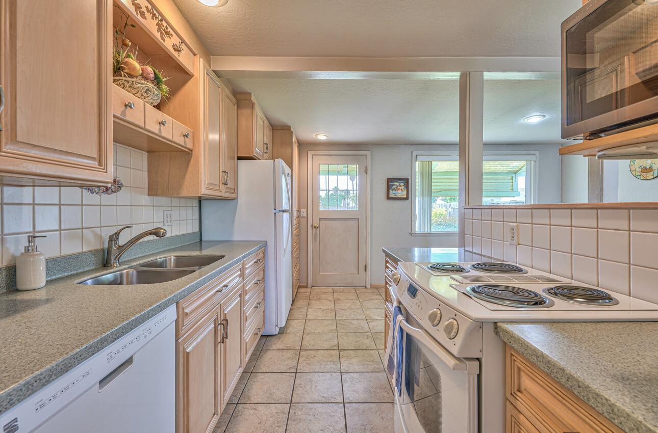 759 Middlefield Road Salinas, CA 93906 - Photo 16 of 26 a kitchen that has a sink and a stove