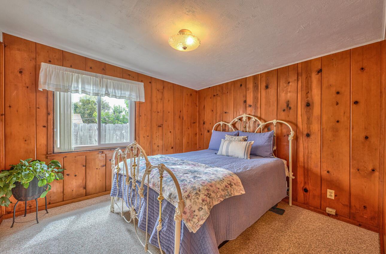 759 Middlefield Road Salinas, CA 93906 - Photo 17 of 26 a bed sitting in a spacious bedroom next to a window