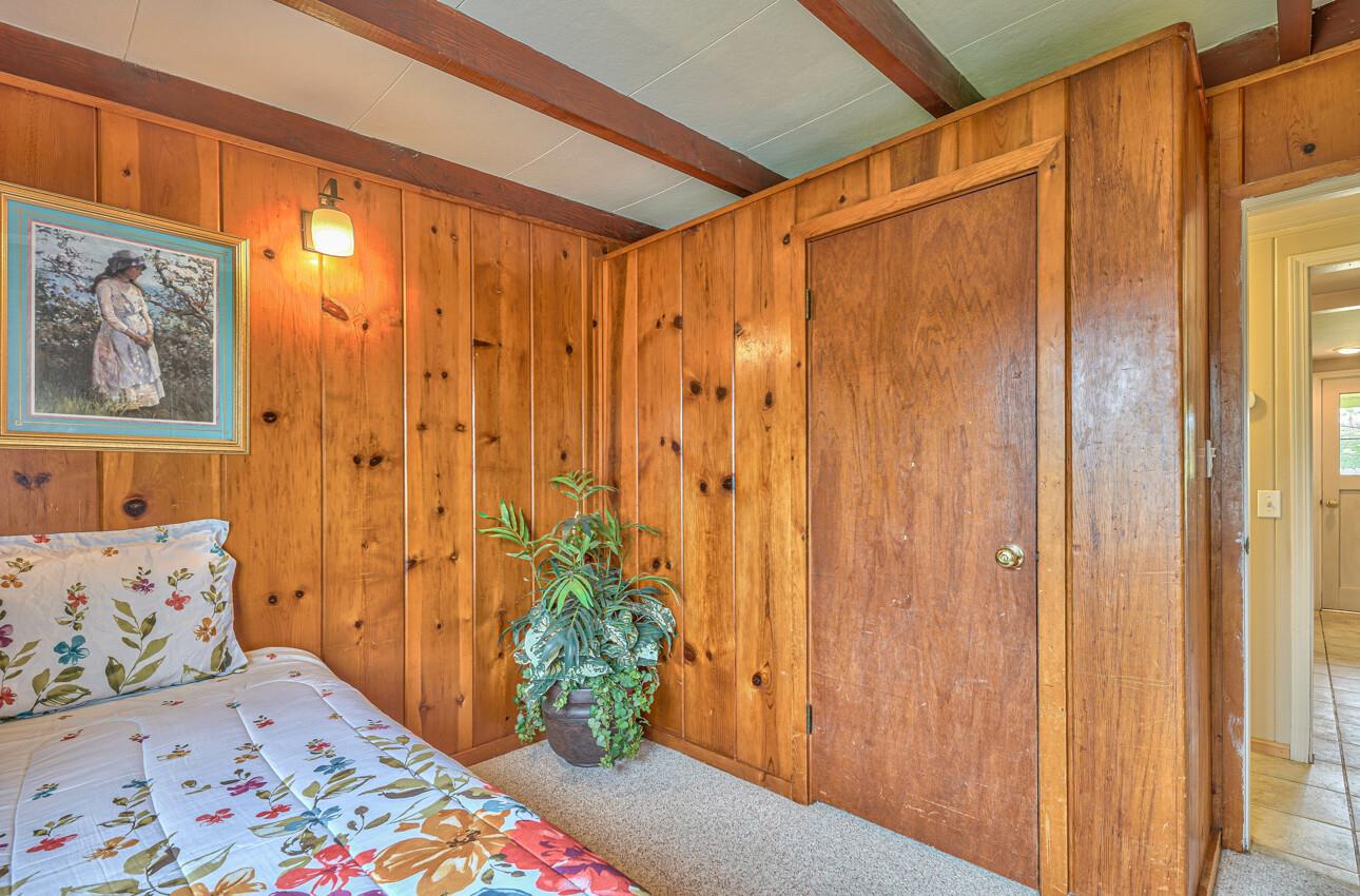 759 Middlefield Road Salinas, CA 93906 - Photo 22 of 26 a bedroom with a bed and a window