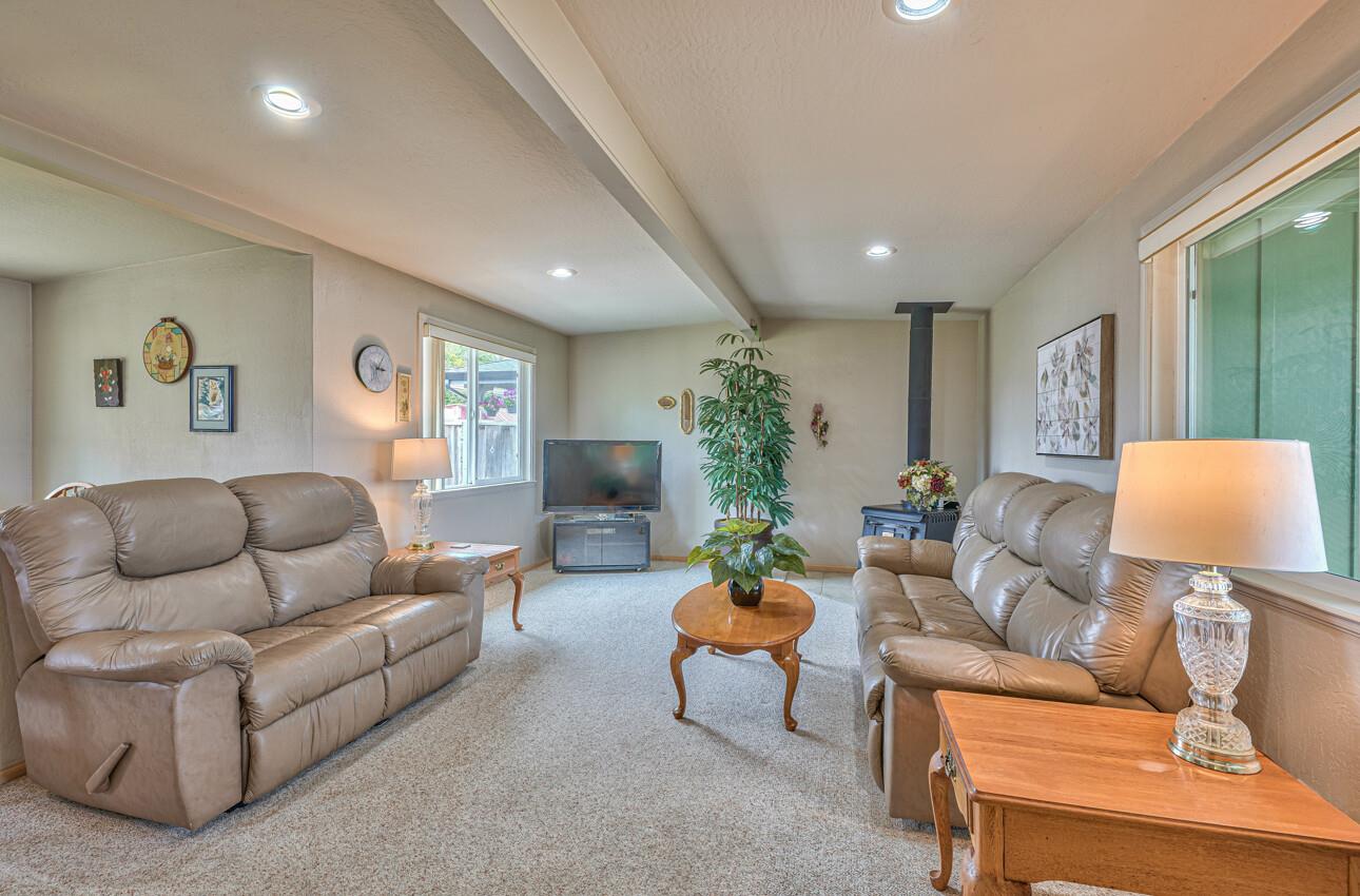 759 Middlefield Road Salinas, CA 93906 - Photo 8 of 26 a living room with furniture and a wooden floor