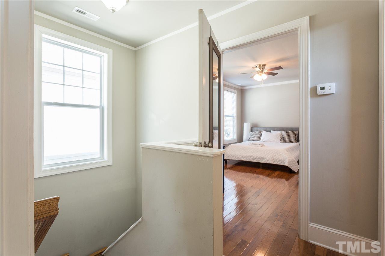 575 East Cabarrus Street Raleigh, NC 27601 - Photo 12 of 20 a bedroom with a bed and a window