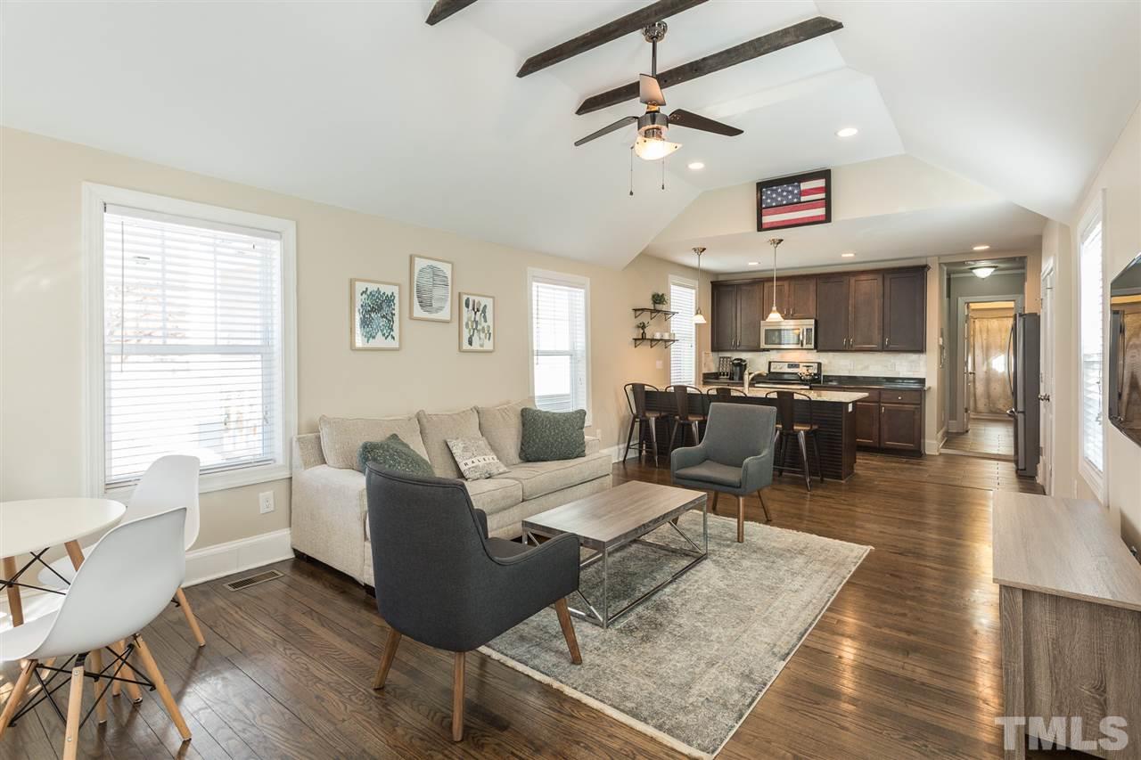 575 East Cabarrus Street Raleigh, NC 27601 - Photo 8 of 20 a living room with furniture and kitchen view