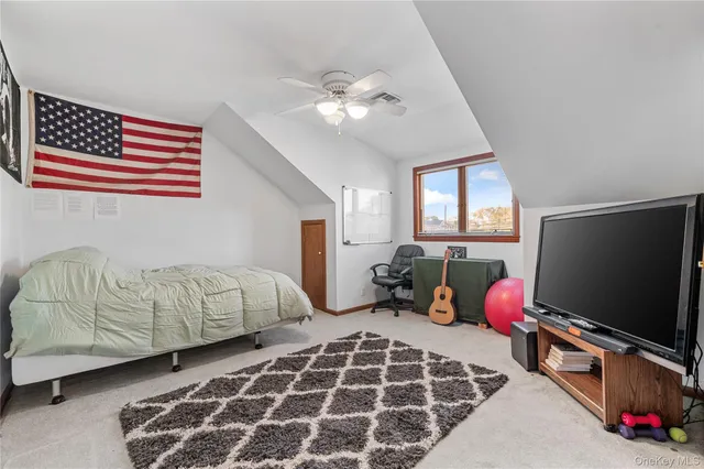 a living room with a couch and a flat screen tv