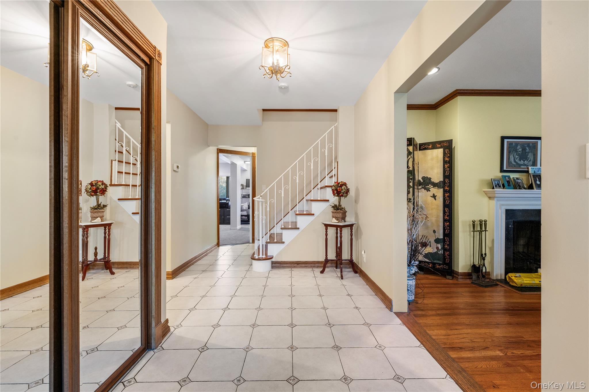 287 East Rockaway Road Hewlett, NY 11557 - Photo 5 of 25 a view of an entryway and livingroom with furniture