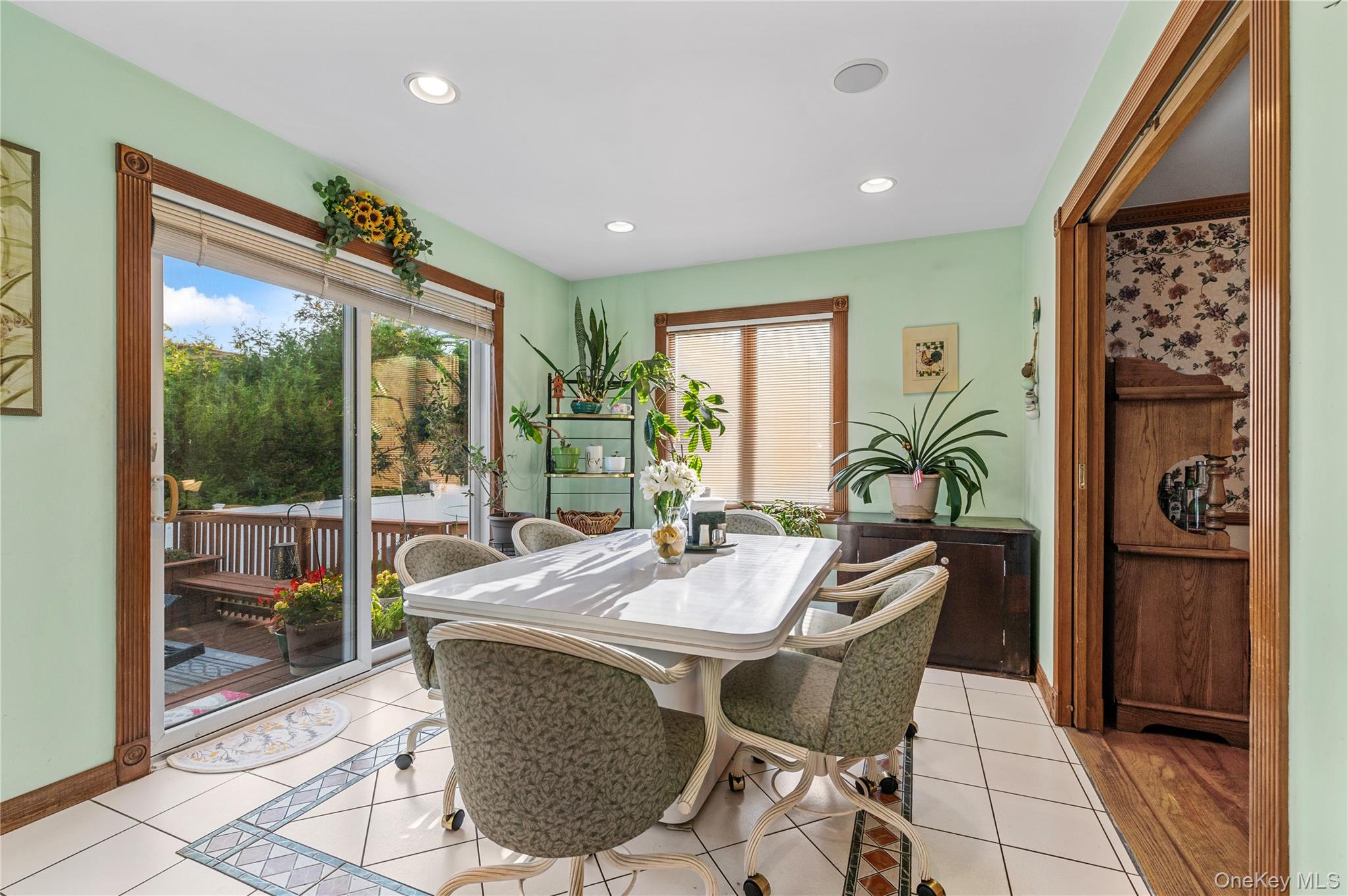 287 East Rockaway Road Hewlett, NY 11557 - Photo 8 of 25 a dining room with furniture and window