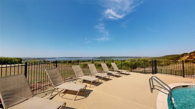 a view of a terrace with a bench