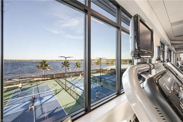 a view of a balcony with furniture