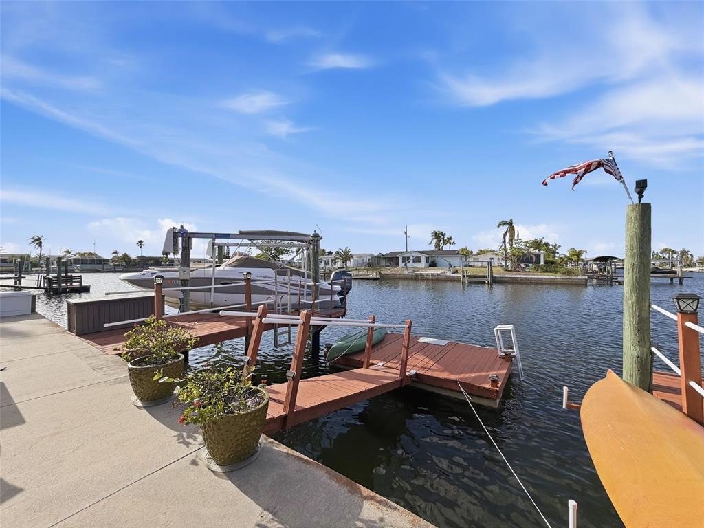 6521 Leeside Isle Hudson, FL 34667 - Photo 41 of 59 a terrace with outdoor seating city view and barbeque oven