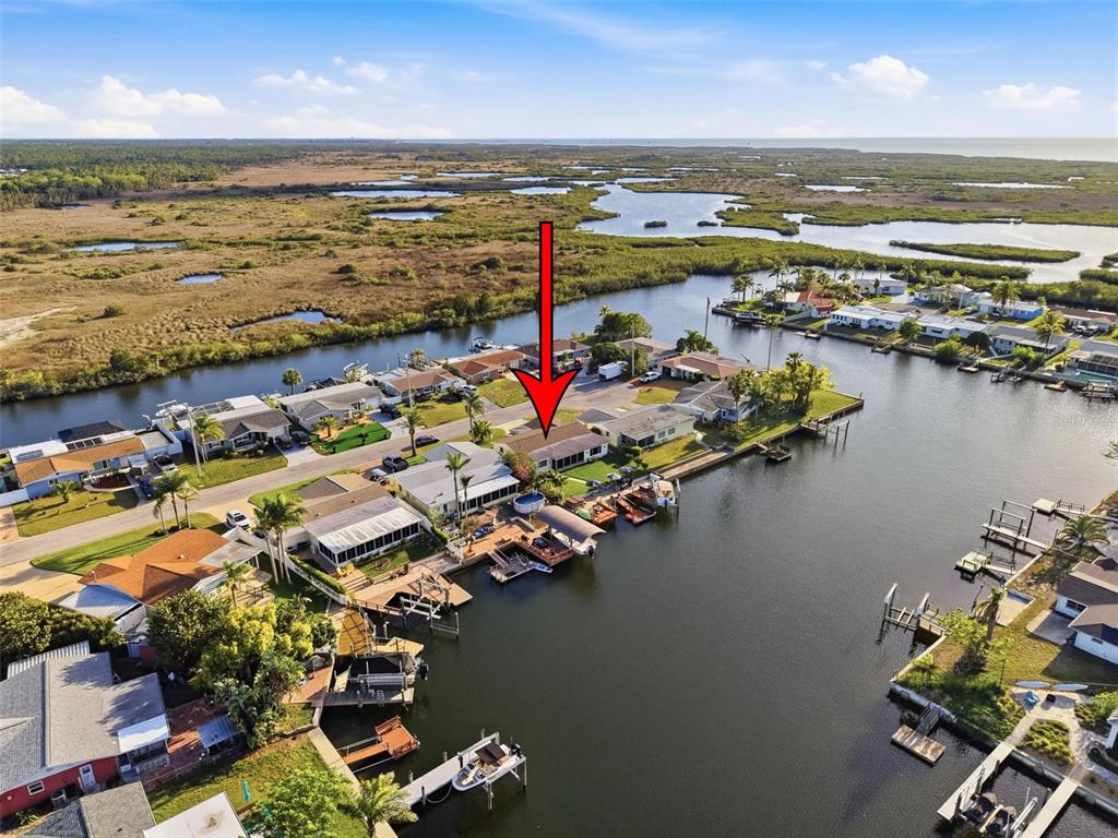 6521 Leeside Isle Hudson, FL 34667 - Photo 54 of 59 an aerial view of ocean boats and trees