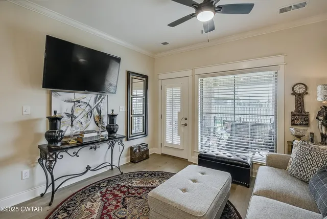 a view of balcony with a couple of chairs