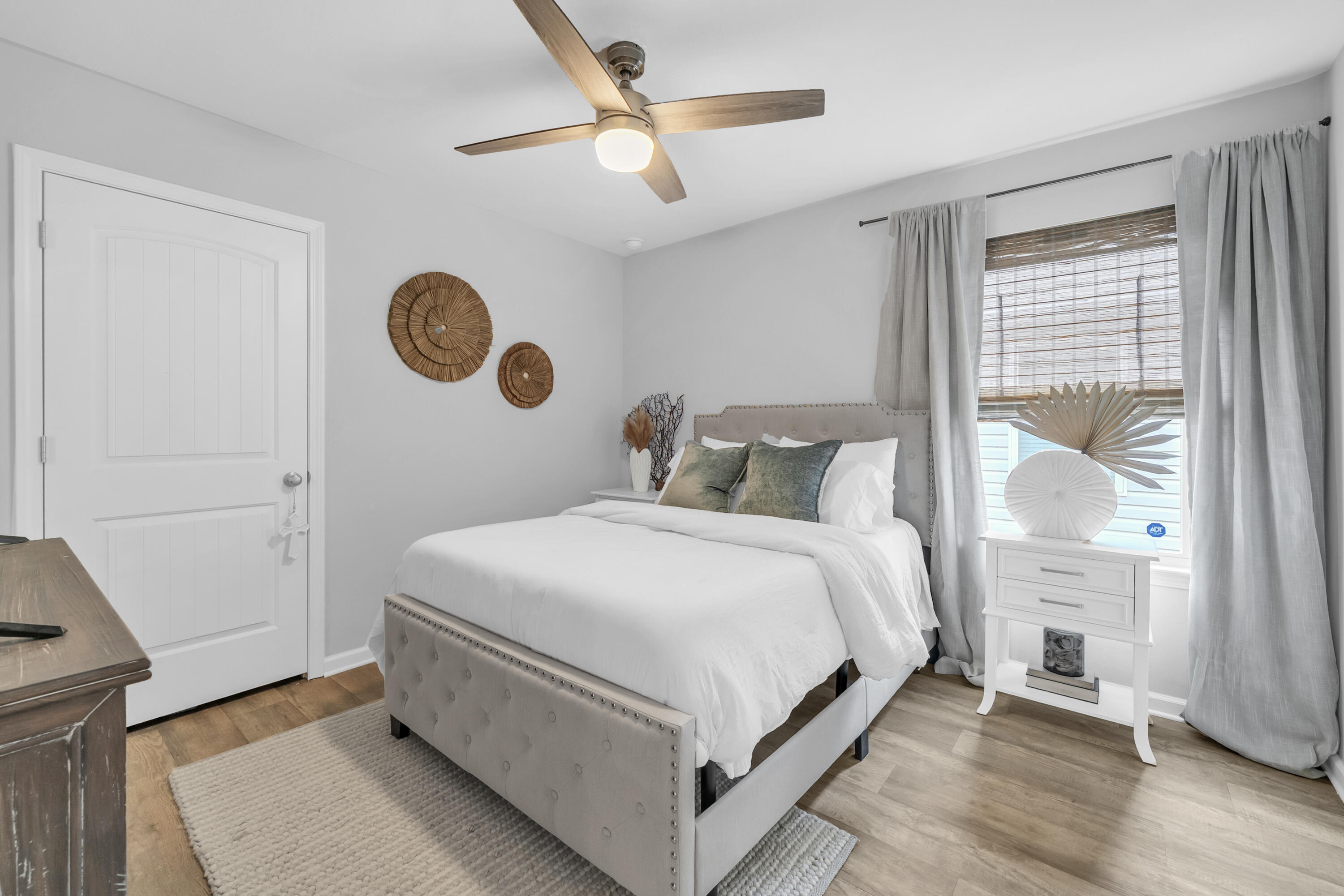 605 Earl Godwin Road Freeport, FL 32439 - Photo 16 of 47 a bedroom with a bed and a window
