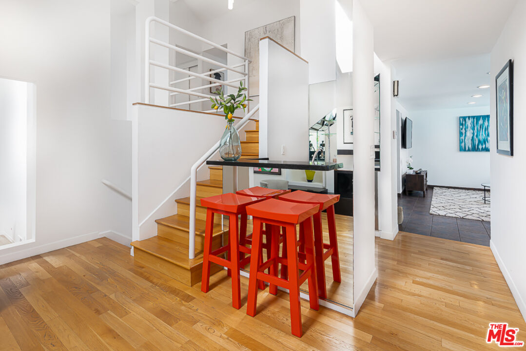 2866 Angelo Drive Los Angeles, CA 90077 - Photo 7 of 31 a living room with furniture and wooden floor