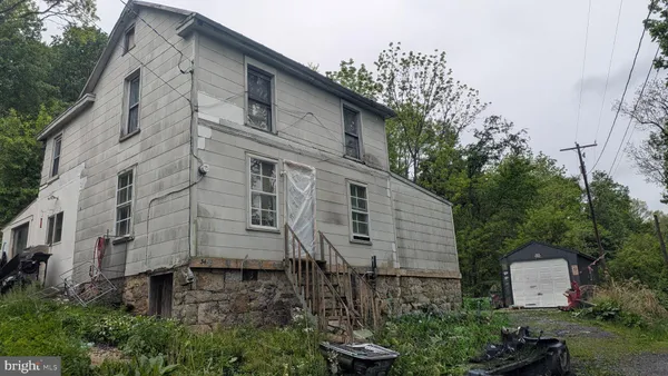 a view of a house with a garden