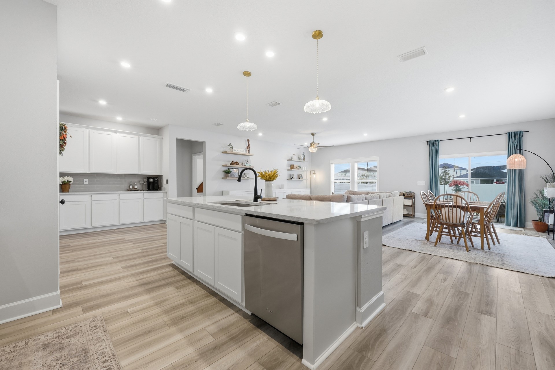 95026 Rocky Place Fernandina Beach, FL 32034 - Photo 13 of 53 a kitchen with a sink microwave and cabinets
