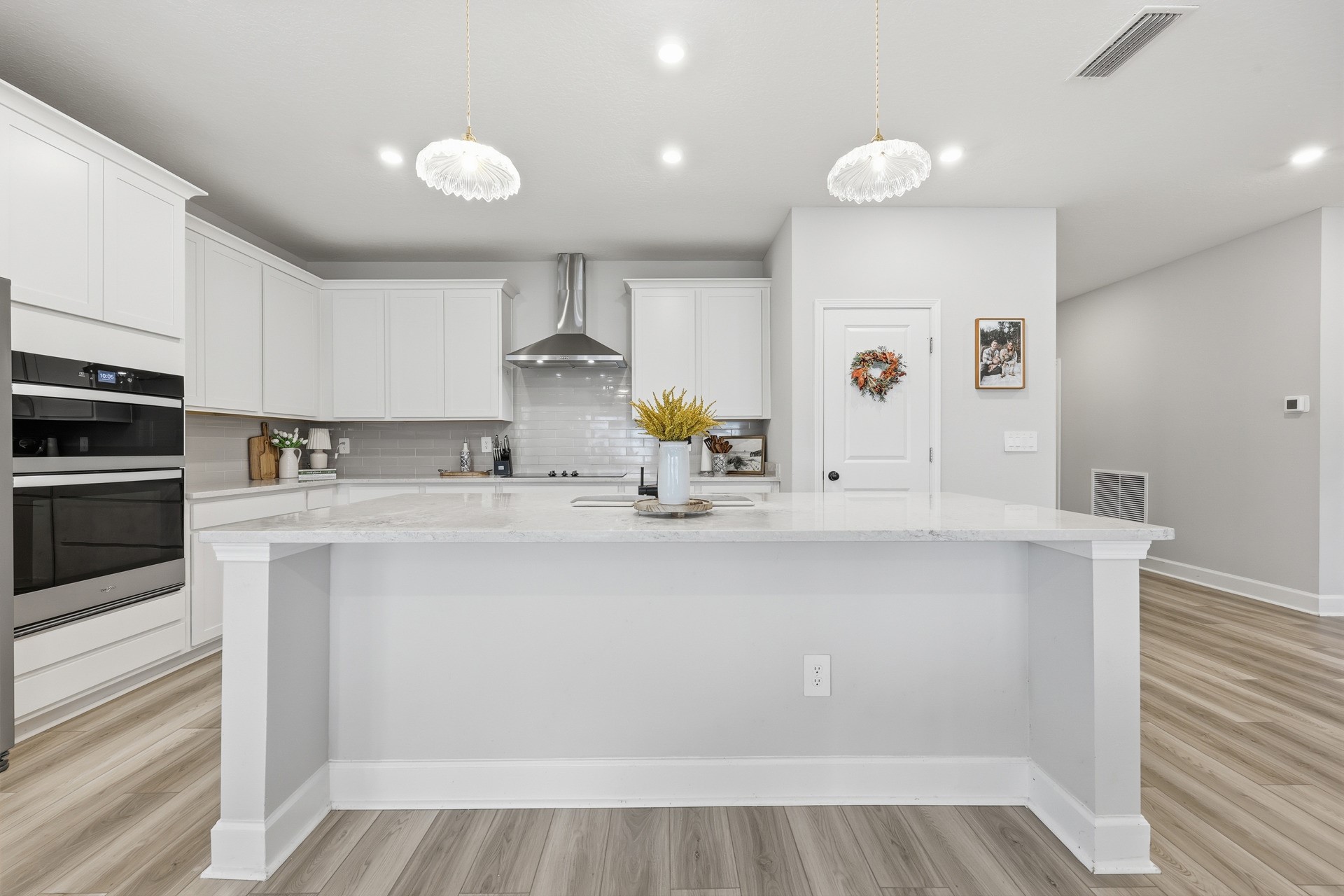 95026 Rocky Place Fernandina Beach, FL 32034 - Photo 17 of 53 a kitchen with stainless steel appliances a sink stove and cabinets