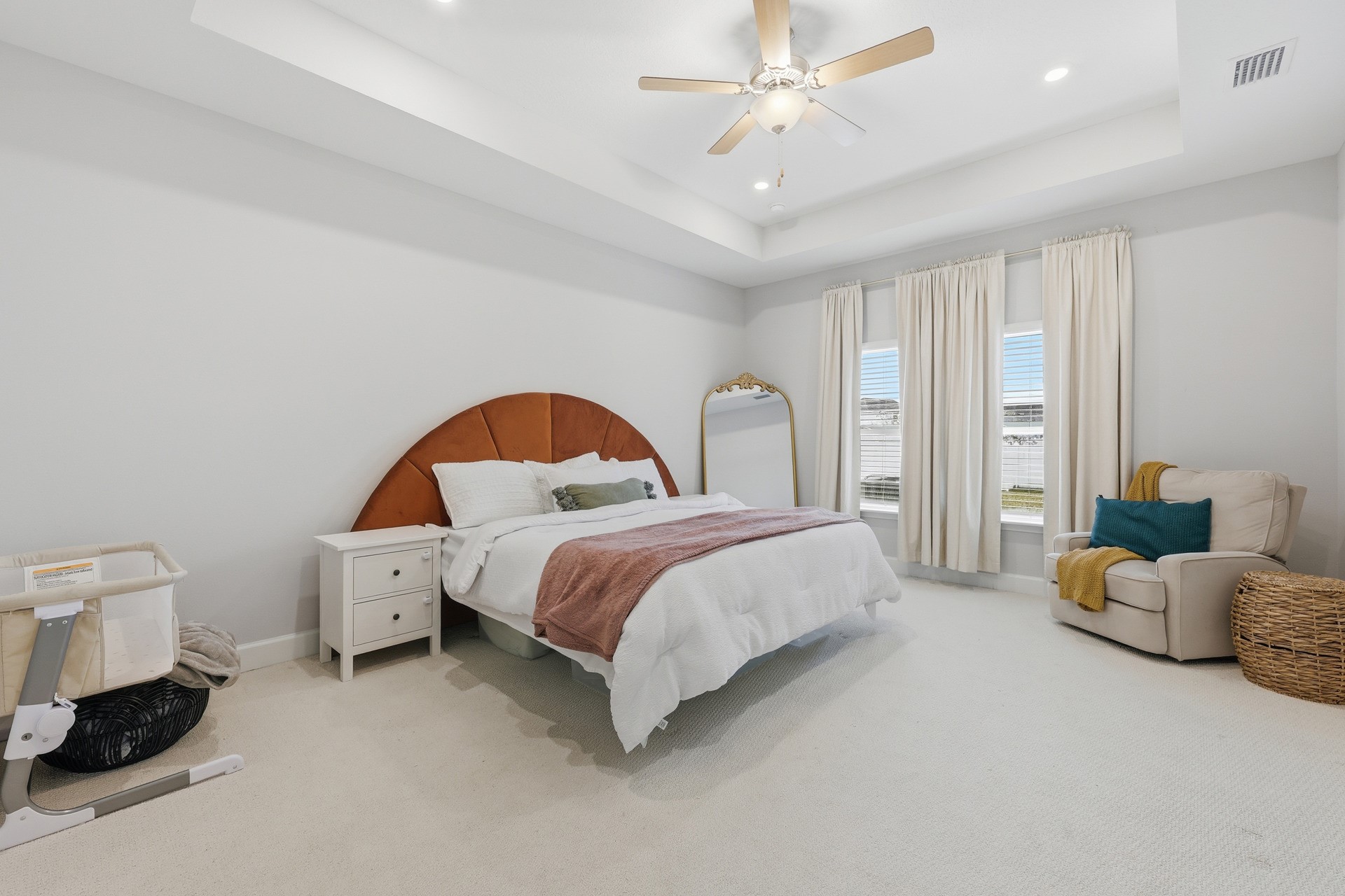 95026 Rocky Place Fernandina Beach, FL 32034 - Photo 19 of 53 a spacious bedroom with a bed and a chandelier