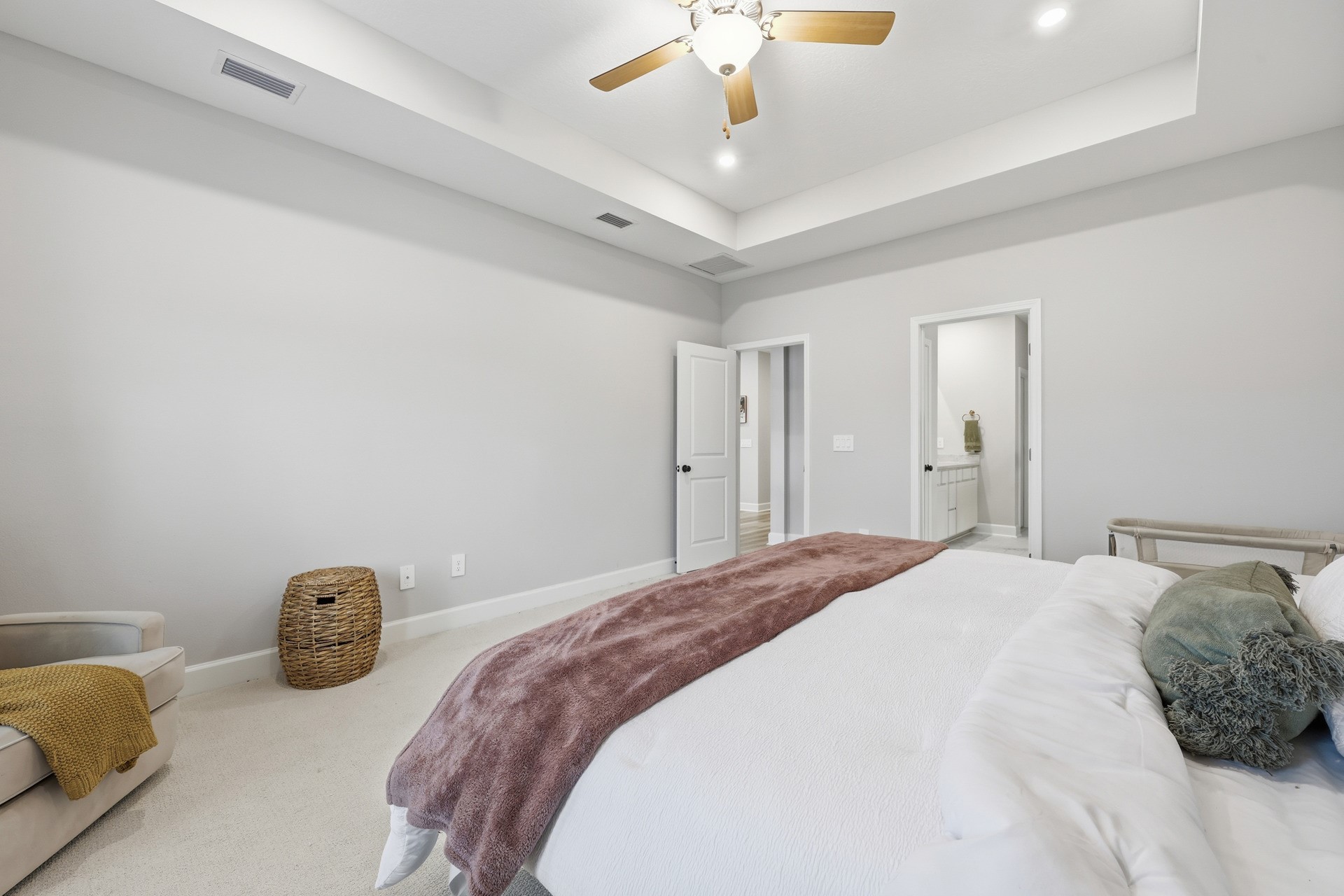 95026 Rocky Place Fernandina Beach, FL 32034 - Photo 21 of 53 a bedroom with a bed and a chandelier