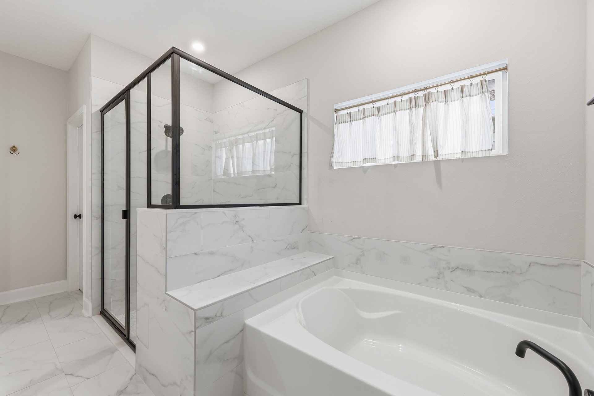 95026 Rocky Place Fernandina Beach, FL 32034 - Photo 24 of 53 a bathroom with a bathtub and a shower