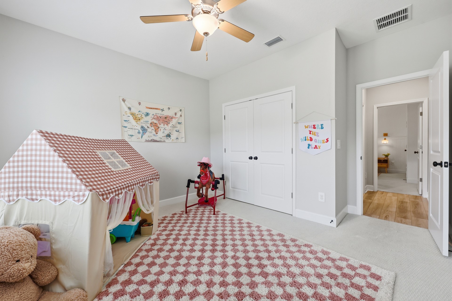 95026 Rocky Place Fernandina Beach, FL 32034 - Photo 35 of 53 a bedroom with furniture and a chandelier